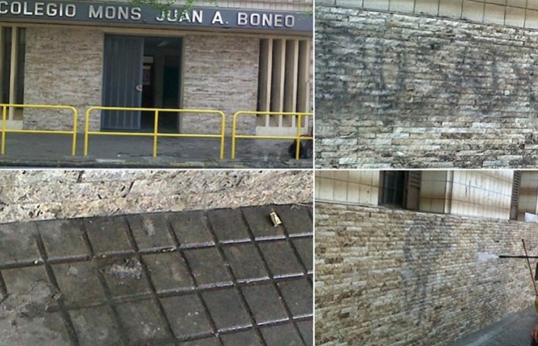 La fachada del frente del colegio Boneo amaneció con impactos de balas y pintadas. Su representante legal es dirigente